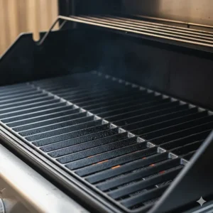 Illustration of porcelain-coated cast iron grates on a 4 burner gas grill, ideal for heat retention and sear marks.