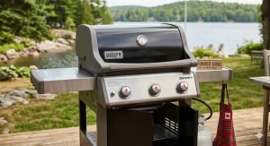 The Weber Spirit E-325, a top-rated gas grill in Canada under $500, shown with a 3-burner setup.