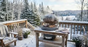 Insulated kamado grill holding heat during a Canadian winter; high-efficiency ceramic BBQ suitable for cold climates.