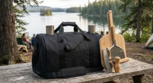 Packed portable pizza oven for camping with a stainless steel pizza peel and durable carry cover.
