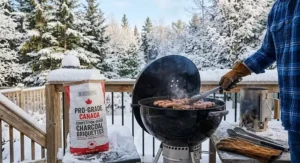 Grilling outdoors in Canadian winter conditions with long-burning competition charcoal briquettes.