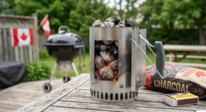 Compact budget charcoal chimney starter under 40 CAD filled with briquettes ready for Canadian summer grilling.