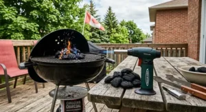 A portable butane fire starter positioned next to charcoal briquettes on a Canadian patio barbecue.